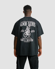 "Good News - Paper Boy" Black Heavyweight Tee - Proclamation Coalition