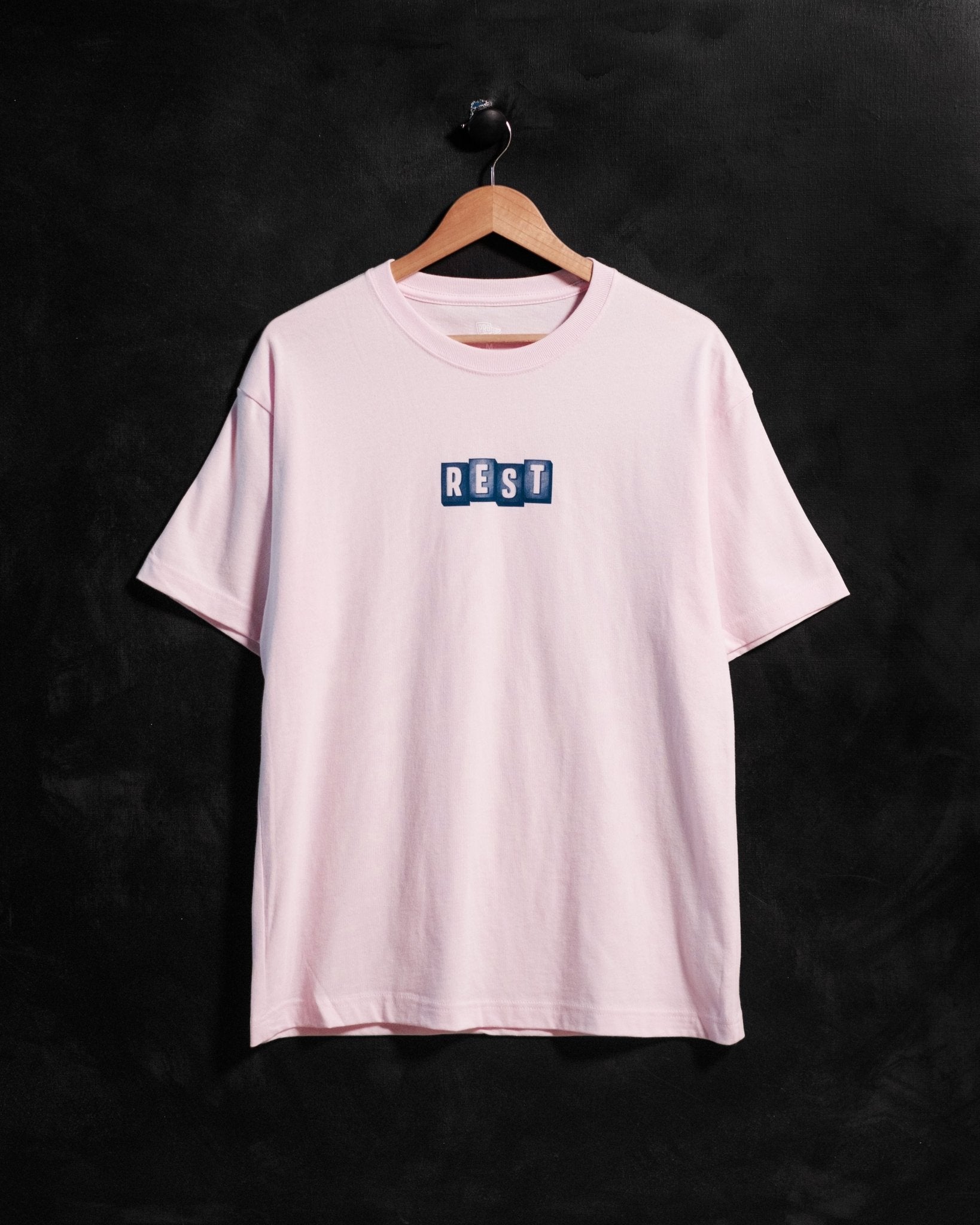 "Rest Motel" Soft Pink Tee - Proclamation Coalition