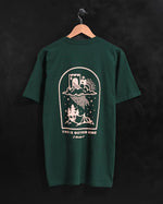 “This is Not Our Home" Dark Green Staple Tee (Limited Edition) - Proclamation Coalition