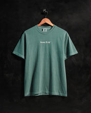 "Treat People Like Jesus Died for Them" Forest Green Tee - Proclamation Coalition
