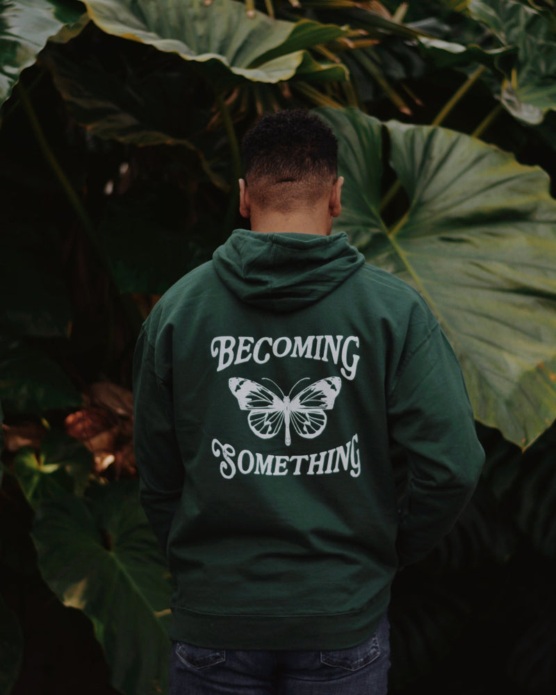 
            
                Load image into Gallery viewer, &amp;quot;Becoming Something Butterfly&amp;quot; - Forest Green Hoodie - Proclamation Coalition
            
        