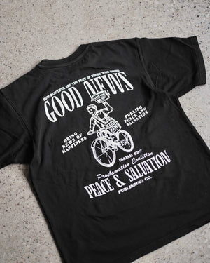 
            
                Load image into Gallery viewer, &amp;quot;Good News - Paper Boy&amp;quot; Black Heavyweight Tee - Proclamation Coalition
            
        