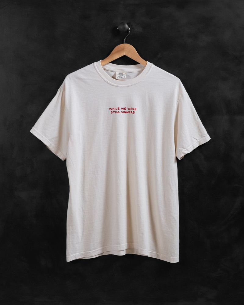 "While We Were Still Sinners" Ivory Tee - Proclamation Coalition